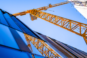 crane and blue building glass
